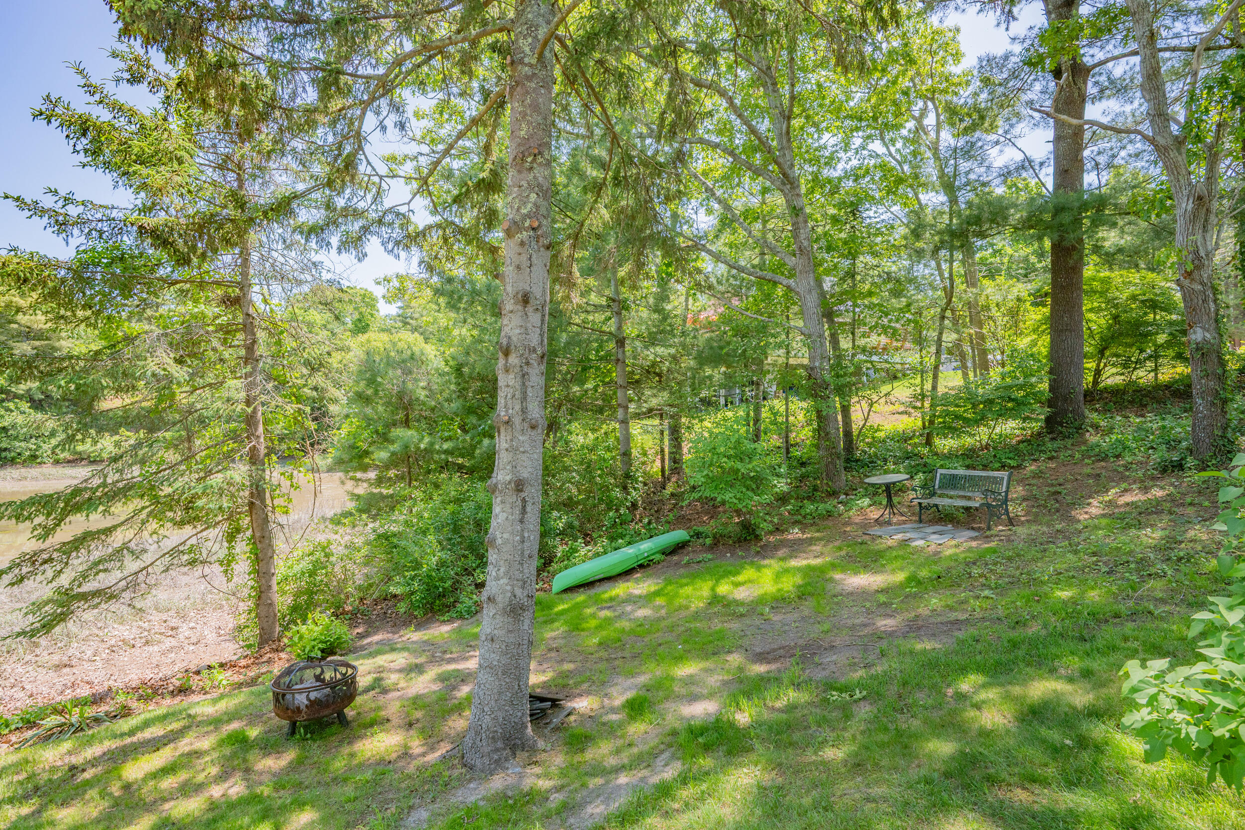 22 Wallace Point Buzzards Bay, MA 02532 - Photo 22 of 30 22 Wallace Point Back Yard with Canoe 1