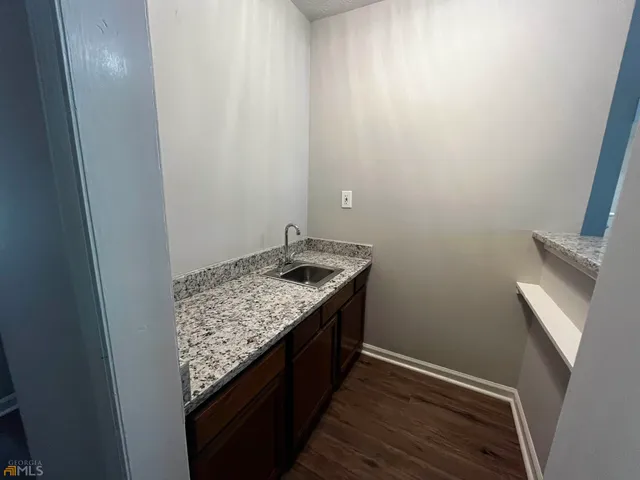 a bathroom with a toilet and a bathtub