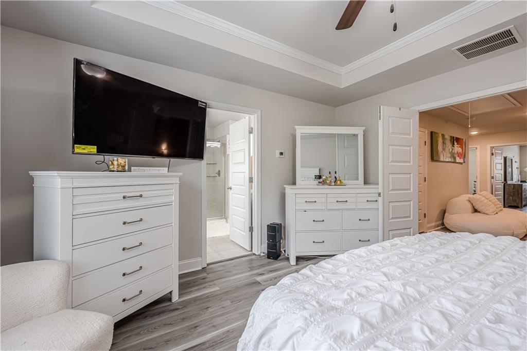 6940 Cedar Glen Road Atlanta, GA 30360 - Photo 14 of 24 a bedroom with a bed room and flat screen tv
