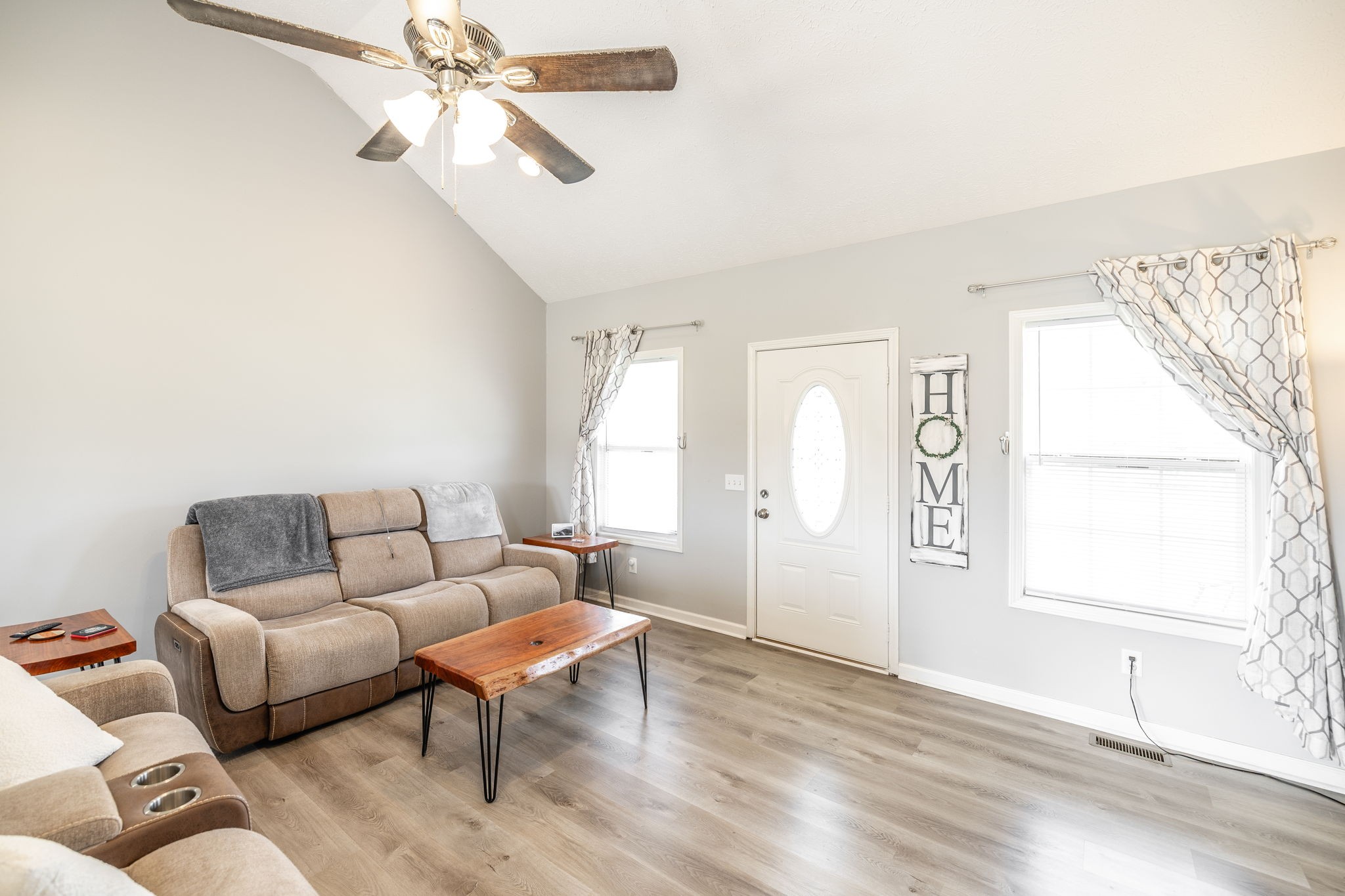 890 Mt Vernon Road Bethpage, TN 37022 - Photo 8 of 34 a living room with furniture and a large window