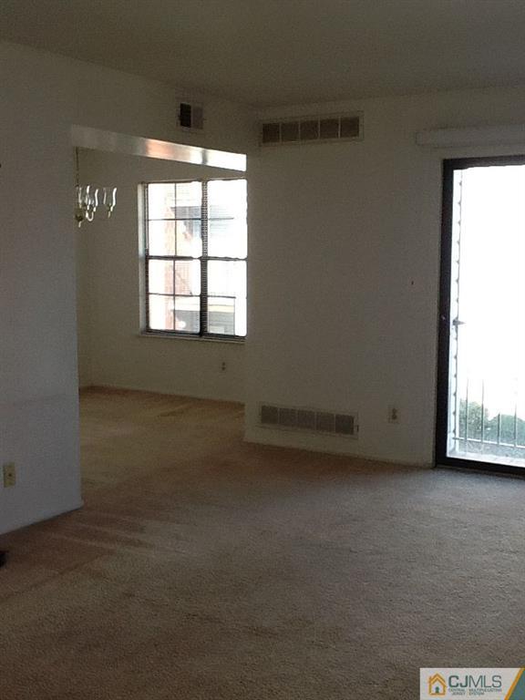 32 Boulder Drive, Unit 32 Edison, NJ 08817 - Photo 12 of 24 an empty room with a window
