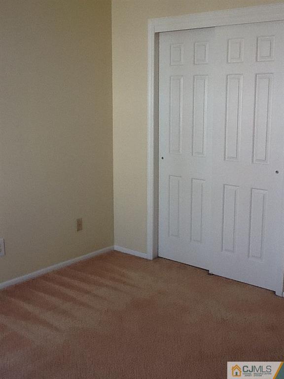 32 Boulder Drive, Unit 32 Edison, NJ 08817 - Photo 13 of 24 a view of an empty room