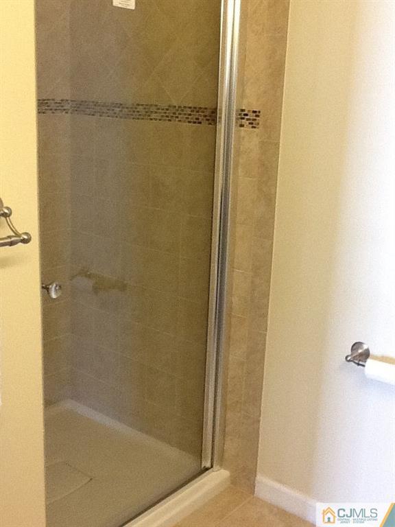32 Boulder Drive, Unit 32 Edison, NJ 08817 - Photo 23 of 24 a bathroom with a shower