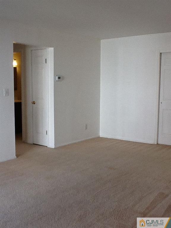 32 Boulder Drive, Unit 32 Edison, NJ 08817 - Photo 9 of 24 a view of an empty room