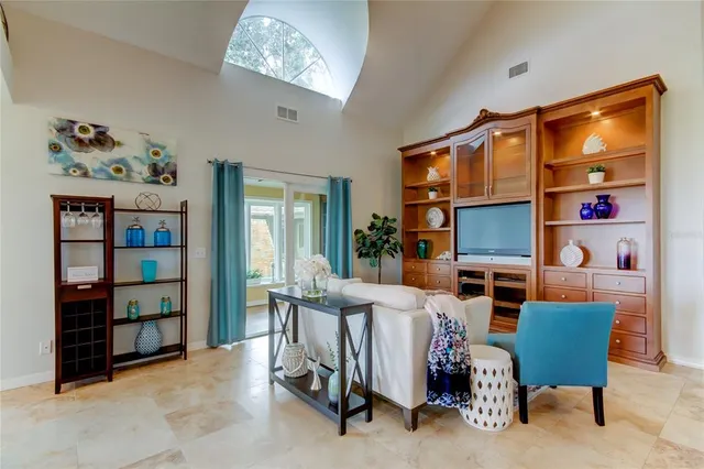a kitchen with granite countertop stainless steel appliances and wooden cabinets