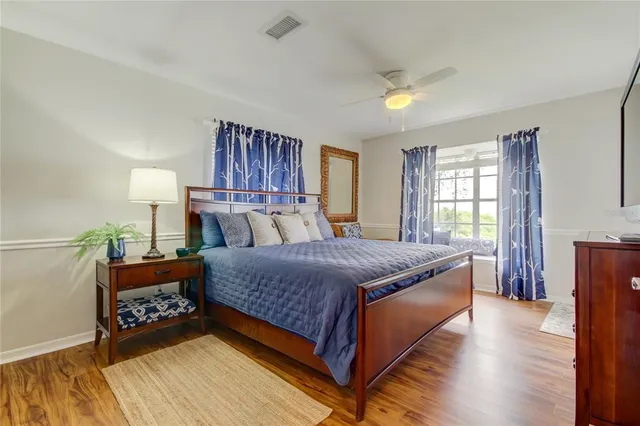a view of a livingroom with furniture and a window