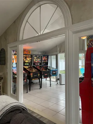 a bathroom with a shower sink and mirror