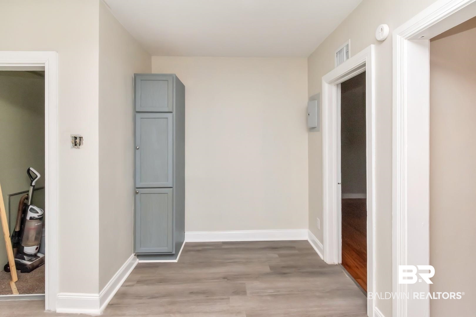292 Siena Vista Street Mobile, AL 36607 - Photo 12 of 30 Hall with light wood finished floors and baseboards