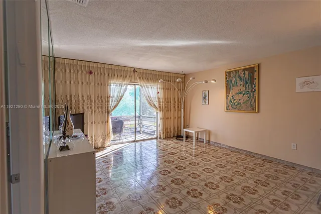 a view of a swimming pool with a sitting space