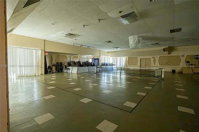 a lobby with gym equipment