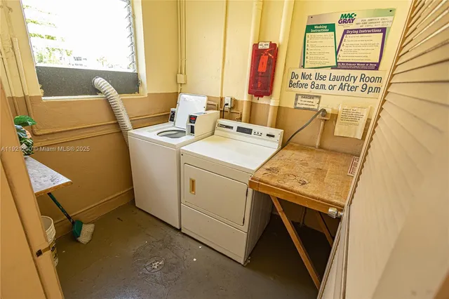 a utility room with dryer and washer