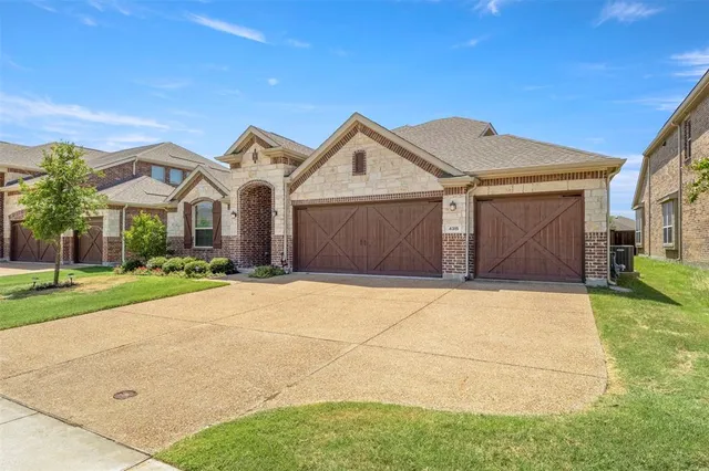 a view of a backyard with a fence
