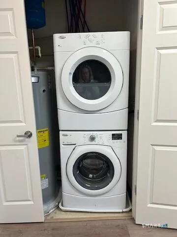 a utility room with dryer and washer