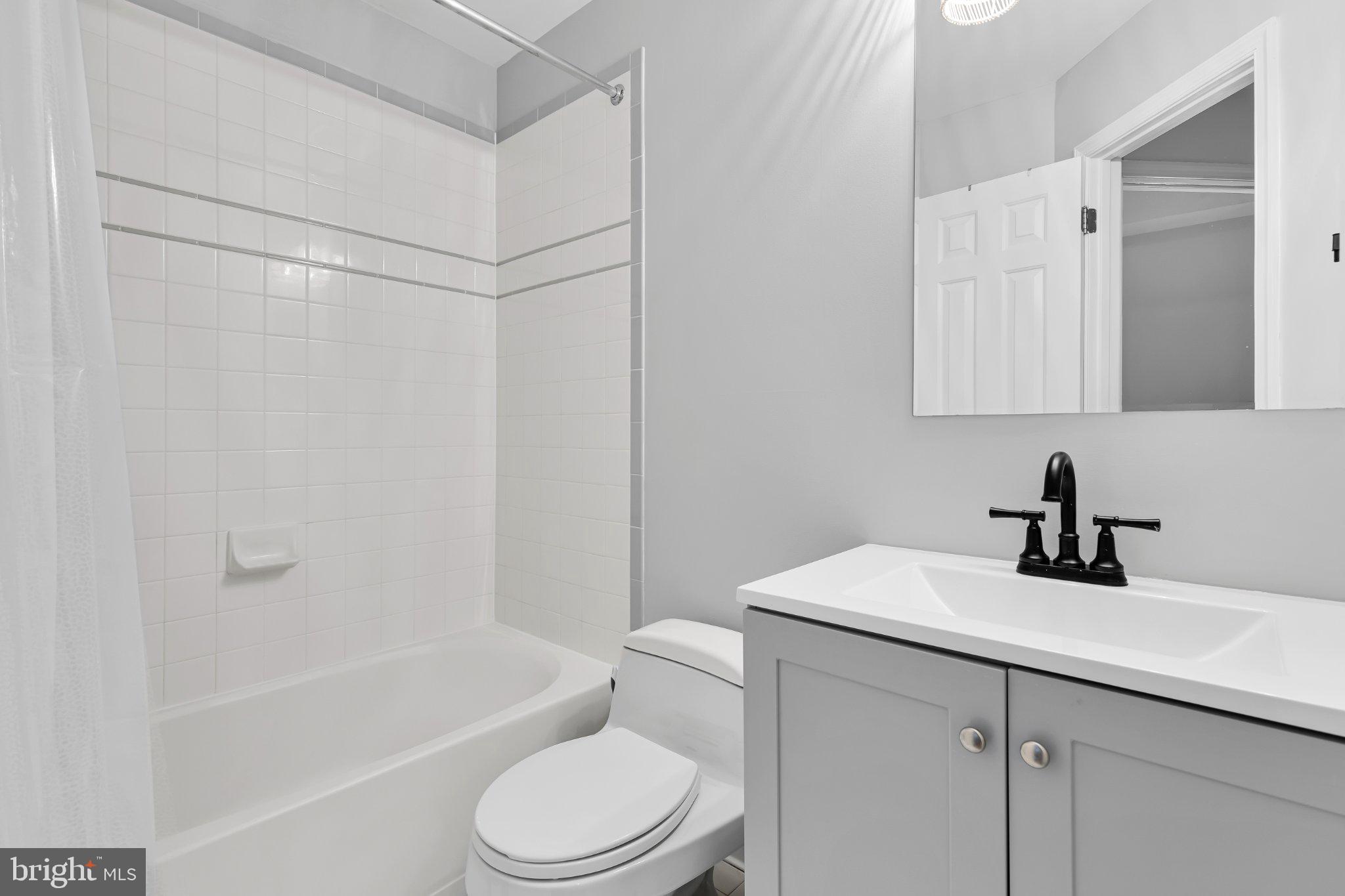 2201 K Street Northwest, Unit 4 Washington, DC 20037 - Photo 12 of 22 Modern bathroom with sleek finishes.