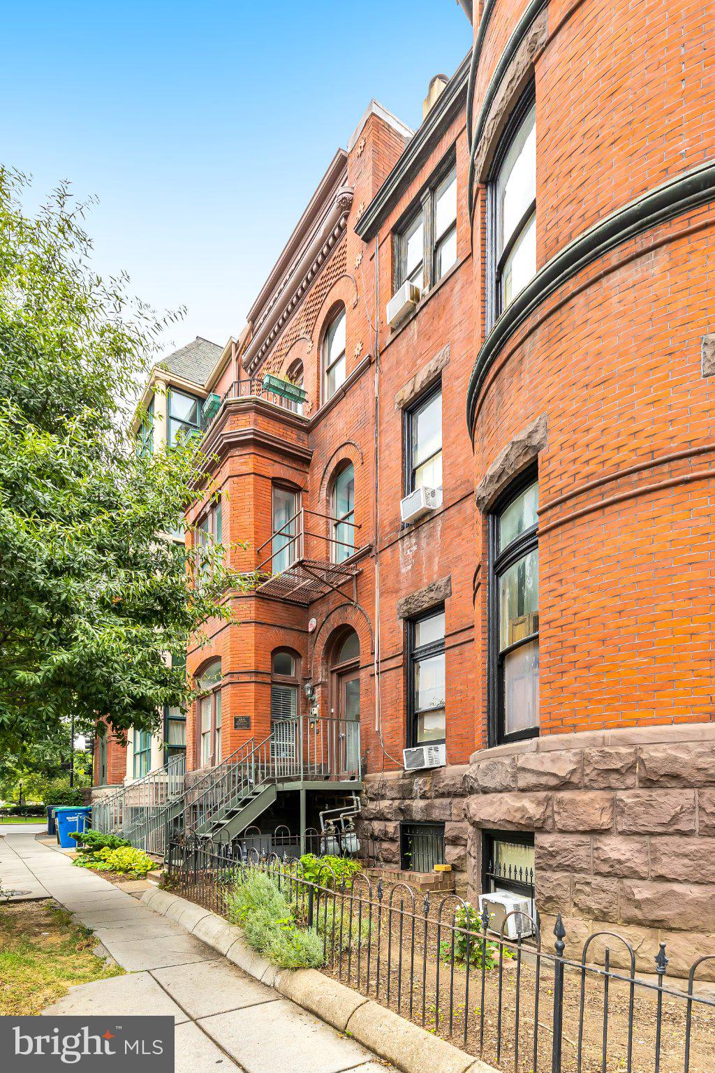 2201 K Street Northwest, Unit 4 Washington, DC 20037 - Photo 21 of 22 Charming brick facade with vintage appeal.