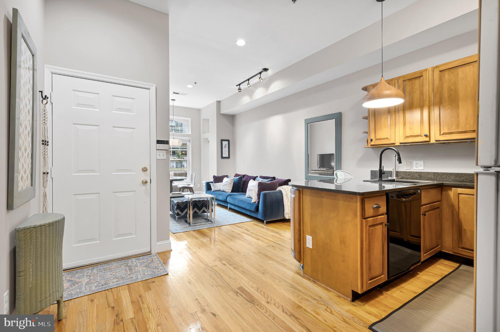 2201 K Street Northwest, Unit 4 Washington, DC 20037 - Photo 10 of 22 Charming open-concept living space.