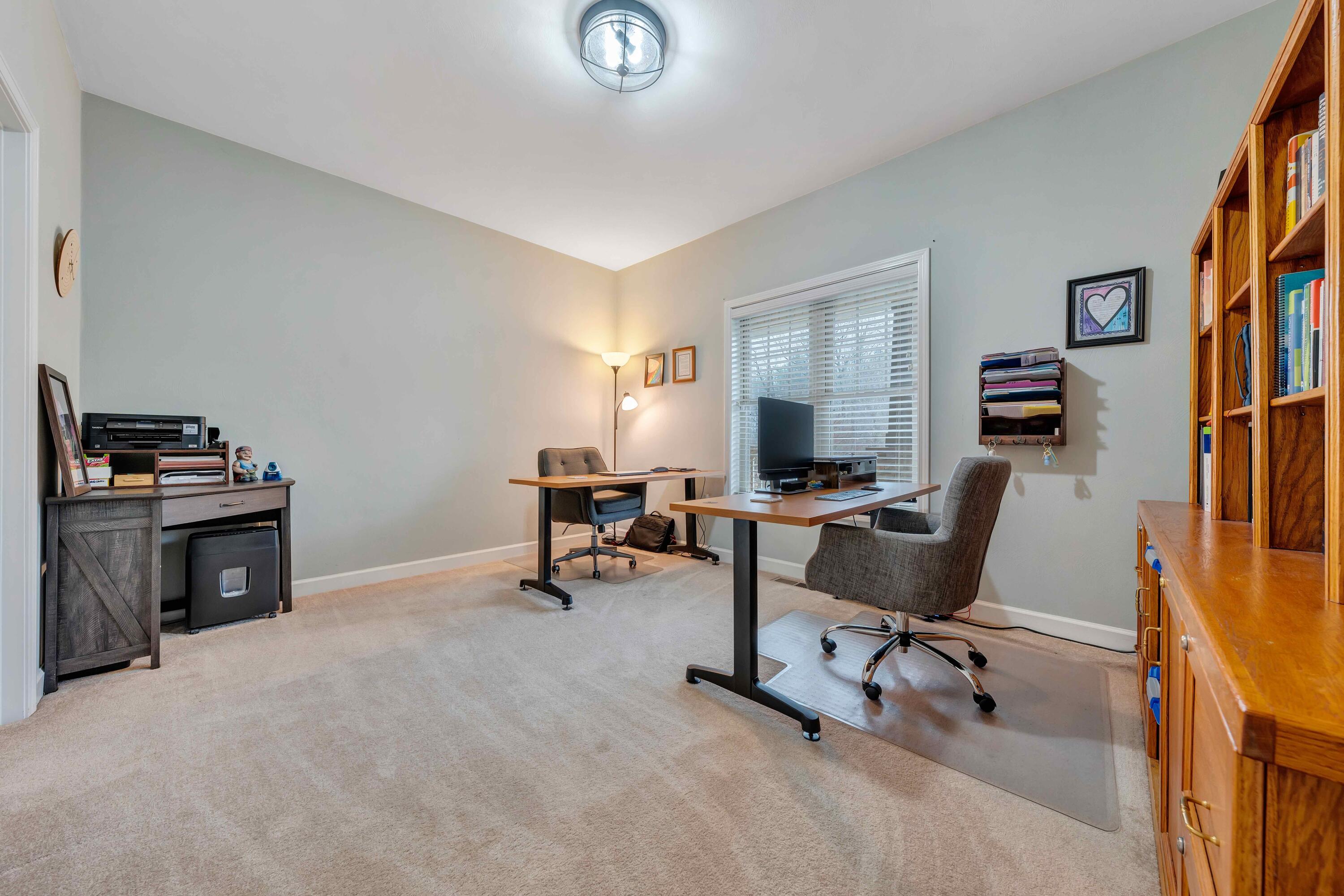7041 Mountain Spring Trail Roanoke, VA 24018 - Photo 11 of 62 a view of a workspace with furniture and a window