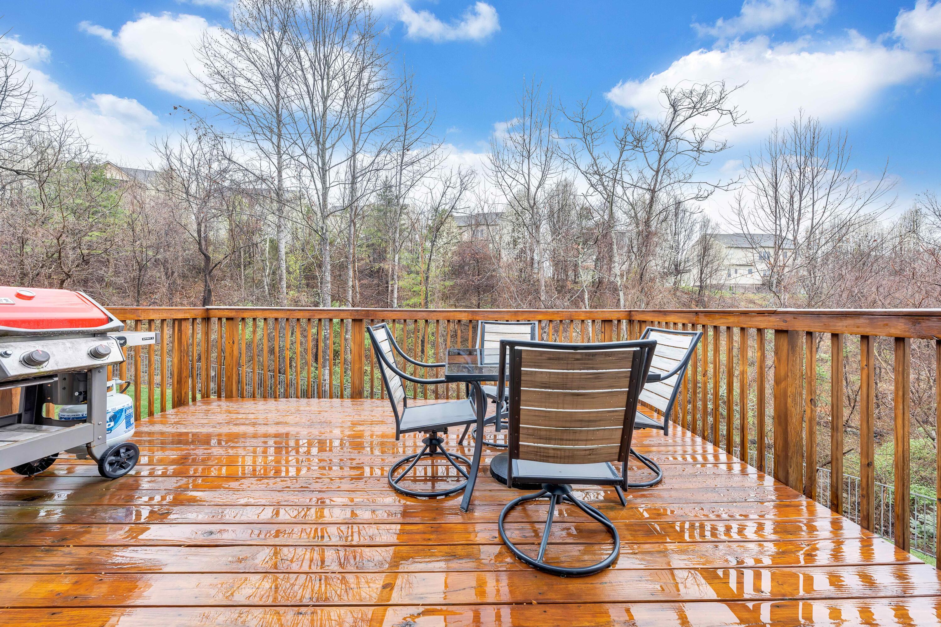 7041 Mountain Spring Trail Roanoke, VA 24018 - Photo 23 of 62 a view of a chairs and table on the patio
