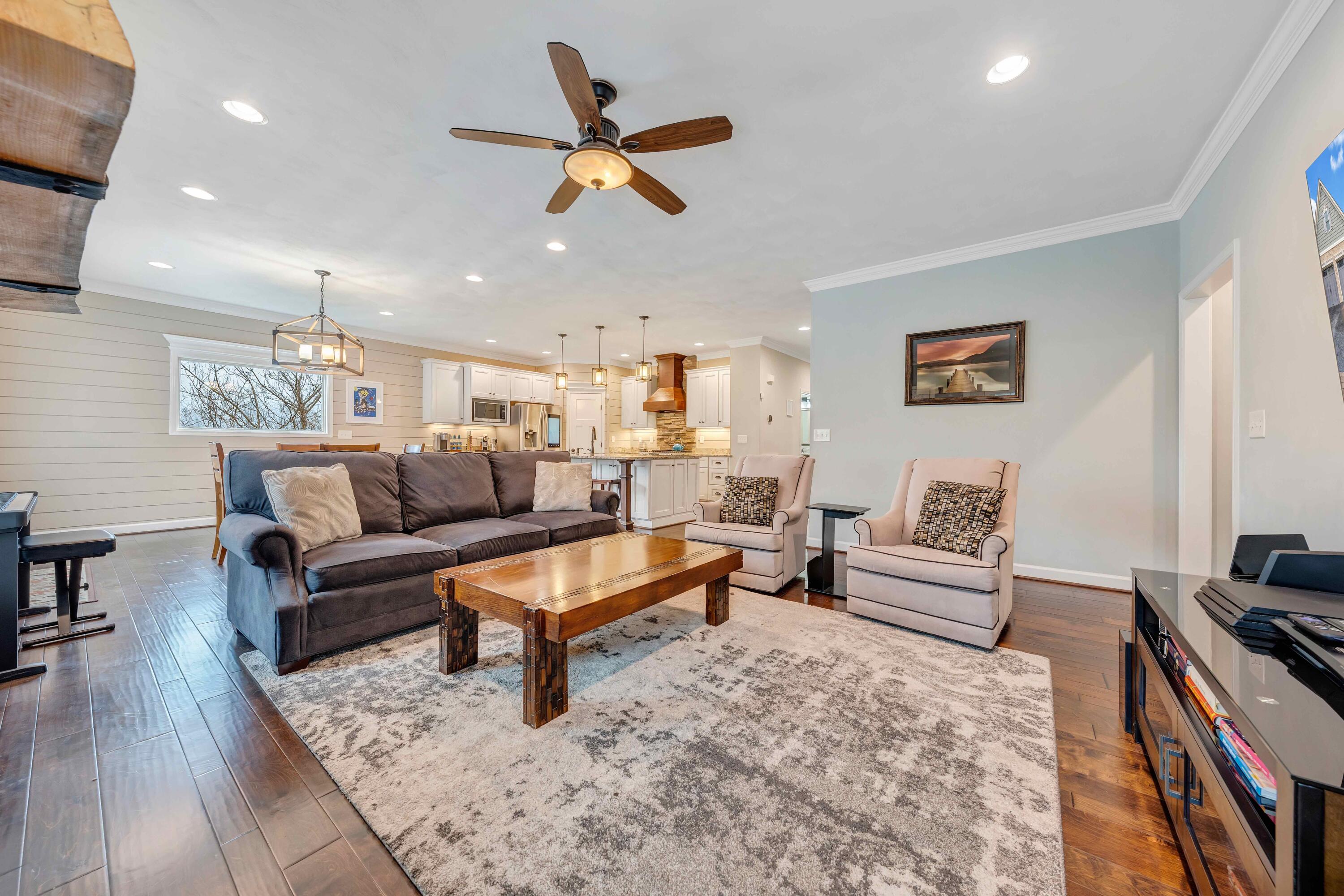 7041 Mountain Spring Trail Roanoke, VA 24018 - Photo 27 of 62 a living room with furniture and a wooden floor