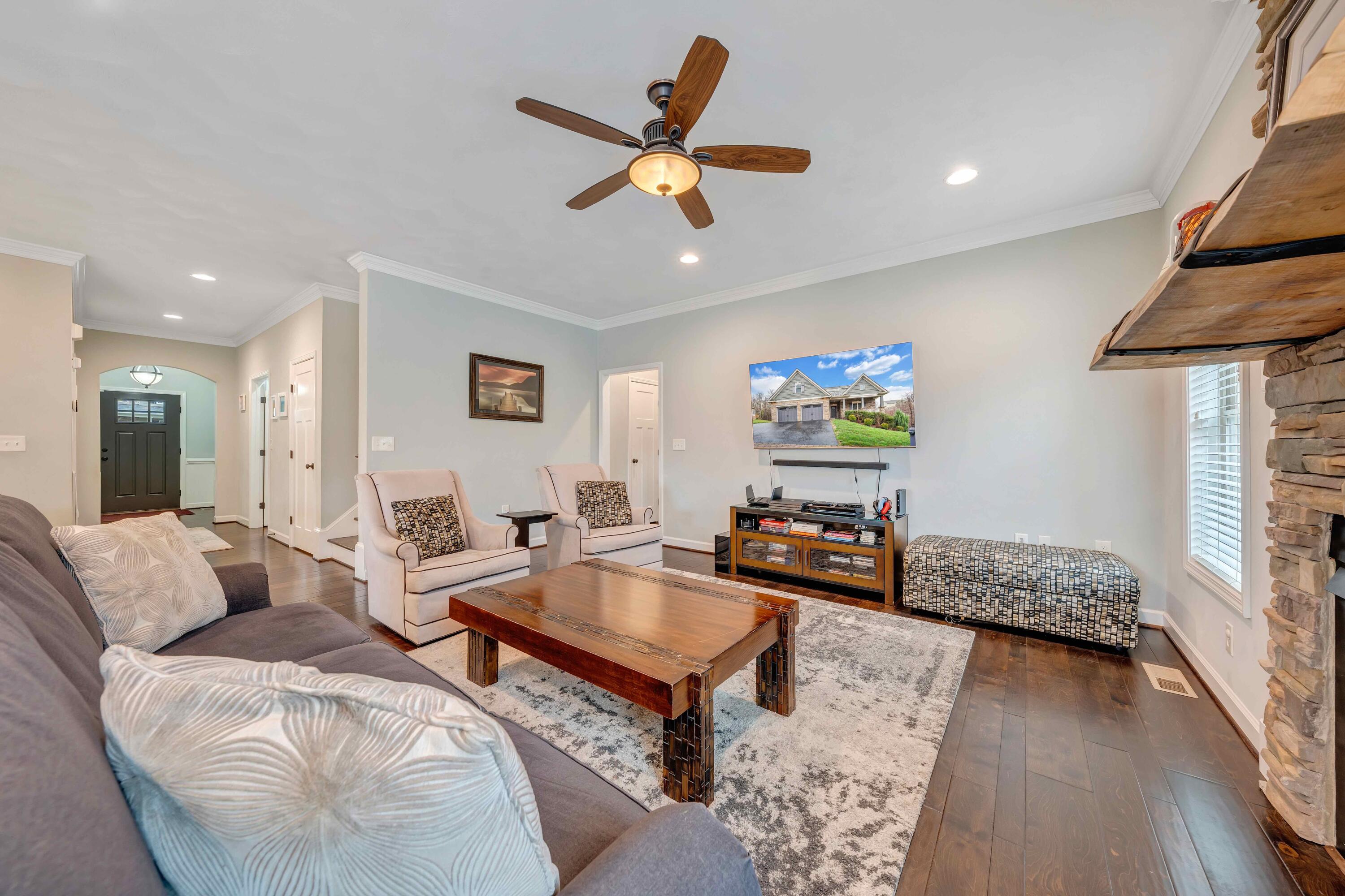 7041 Mountain Spring Trail Roanoke, VA 24018 - Photo 28 of 62 a living room with furniture and wooden floor