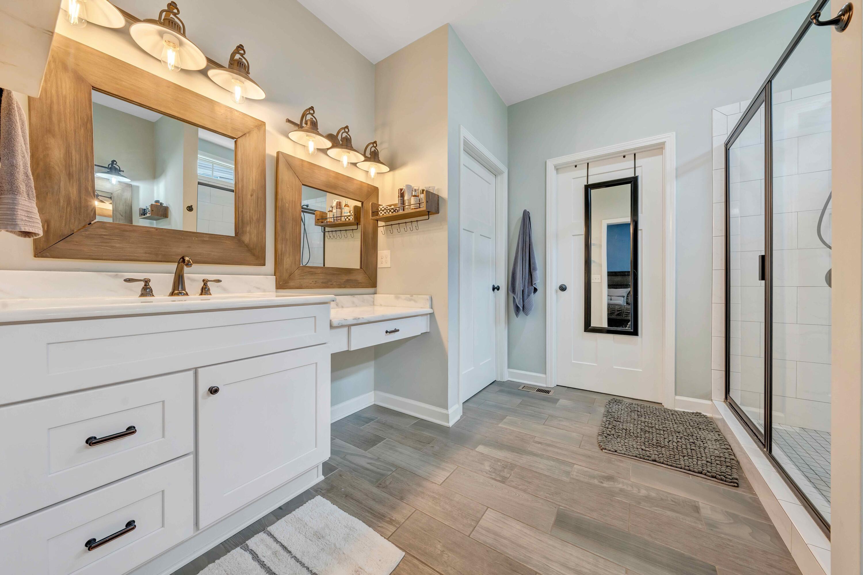 7041 Mountain Spring Trail Roanoke, VA 24018 - Photo 32 of 62 a spacious bathroom with a double vanity sink mirror and
