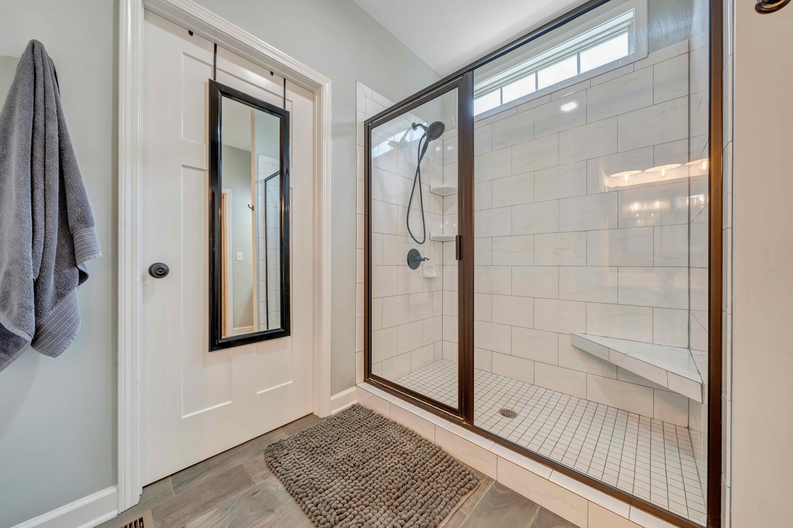 7041 Mountain Spring Trail Roanoke, VA 24018 - Photo 35 of 62 a view of a bathroom with a glass door shower