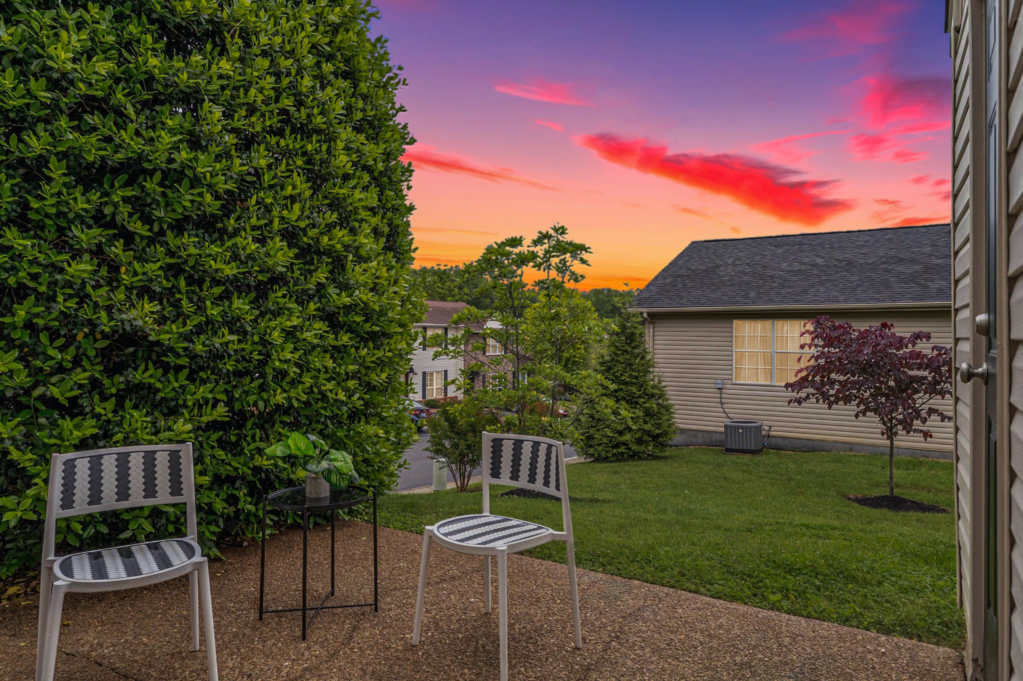 7100 Wheat Road Fairview, TN 37062 - Photo 22 of 25 a view of a chair and table in the backyard