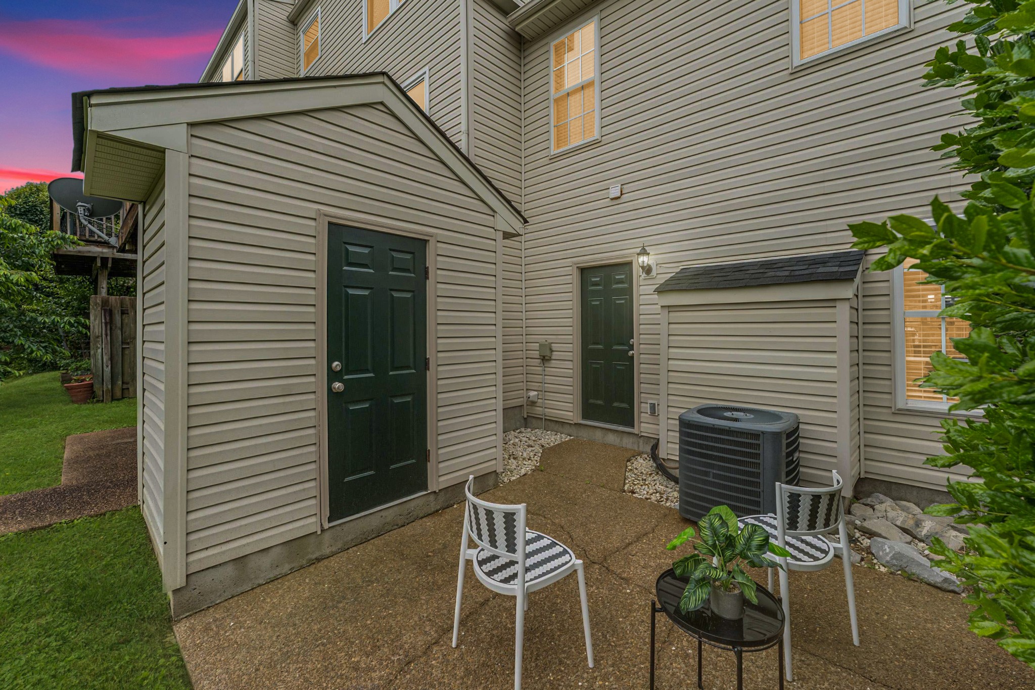7100 Wheat Road Fairview, TN 37062 - Photo 23 of 25 a balcony with table and chairs and potted plants