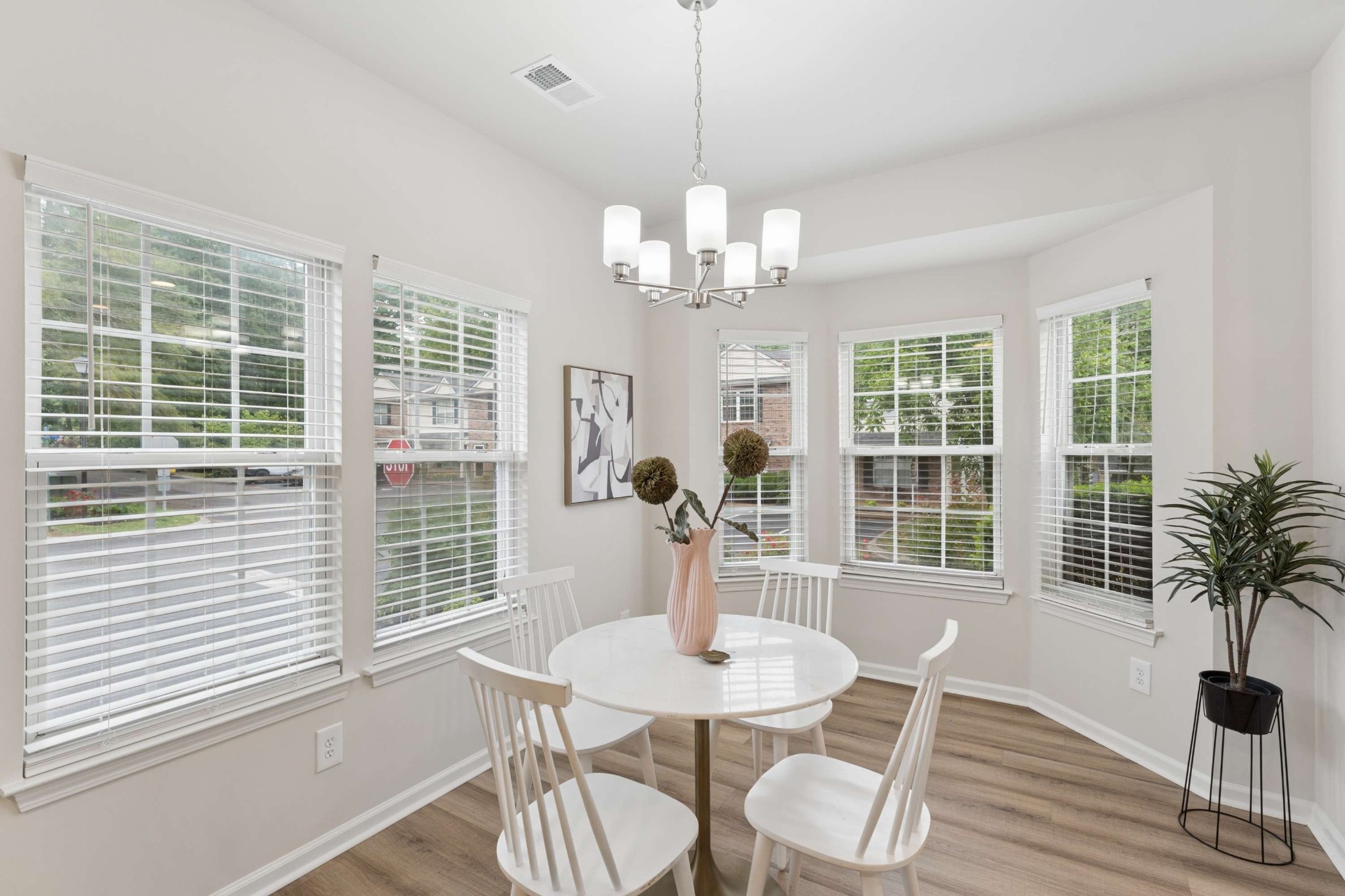 7100 Wheat Road Fairview, TN 37062 - Photo 4 of 25 a view of a dining room with furniture wooden floor and chandelier