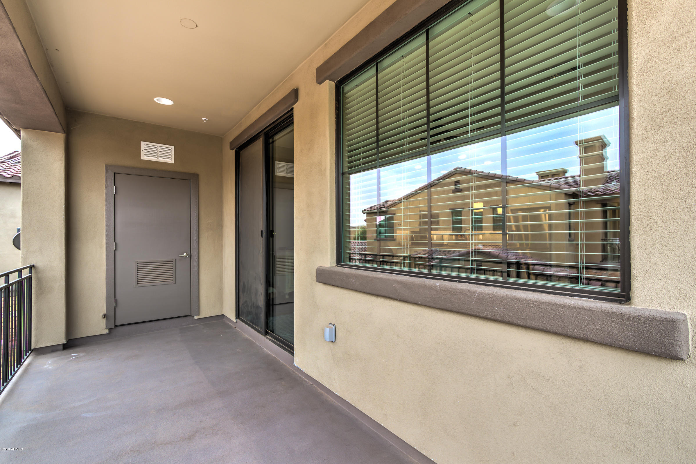 4777 South Fulton Ranch Boulevard, Unit 2111 Chandler, AZ 85248 - Photo 11 of 32 Living Room Balcony