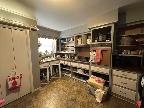 a view of a workspace with furniture