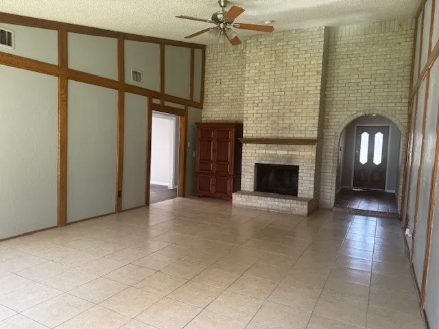 a kitchen with stainless steel appliances granite countertop a stove and a refrigerator