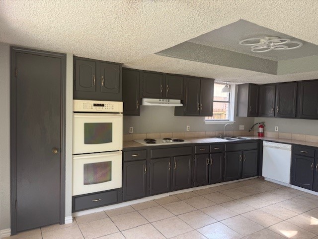 10106 Prairie Mist Street Houston, TX 77088 - Photo 6 of 20 a kitchen with stainless steel appliances granite countertop a stove and a refrigerator
