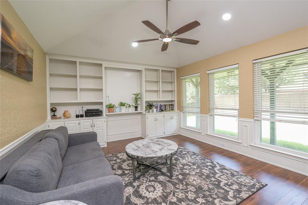 116 Meadowglen Circle Coppell, TX 75019 - Photo 13 of 32 a living room with furniture and a large window