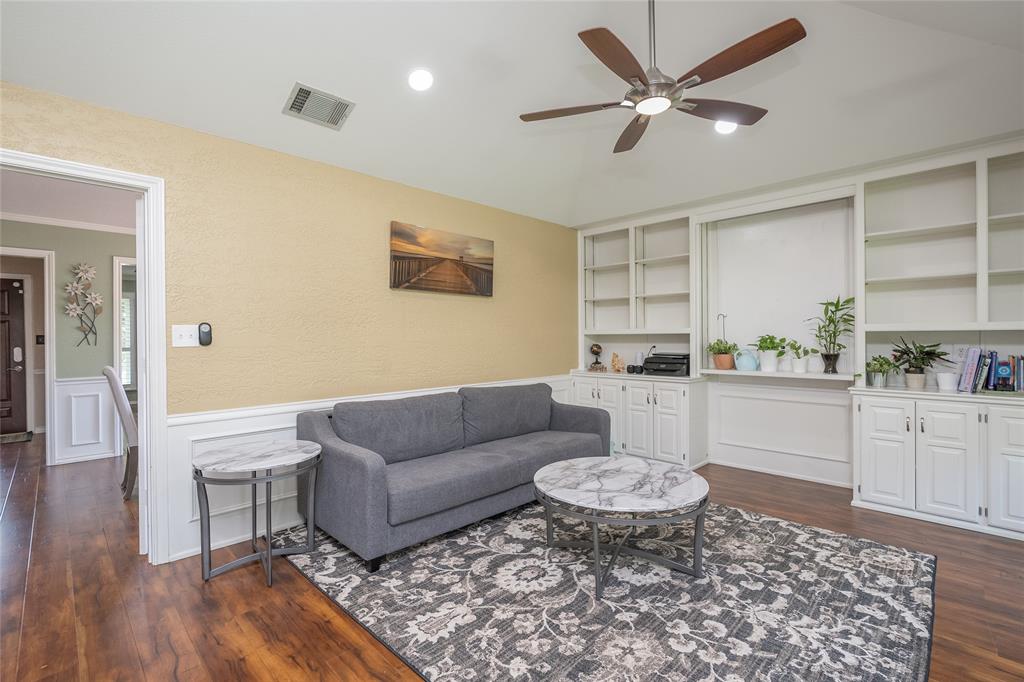 116 Meadowglen Circle Coppell, TX 75019 - Photo 14 of 32 a living room with furniture and a wooden floor