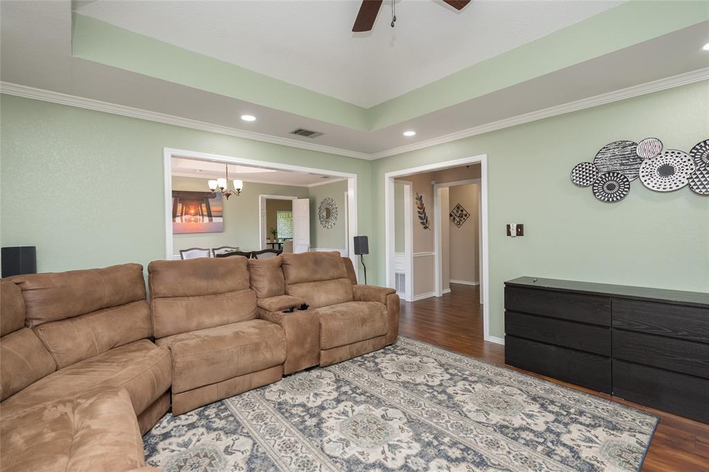 116 Meadowglen Circle Coppell, TX 75019 - Photo 4 of 32 a living room with furniture and a couch