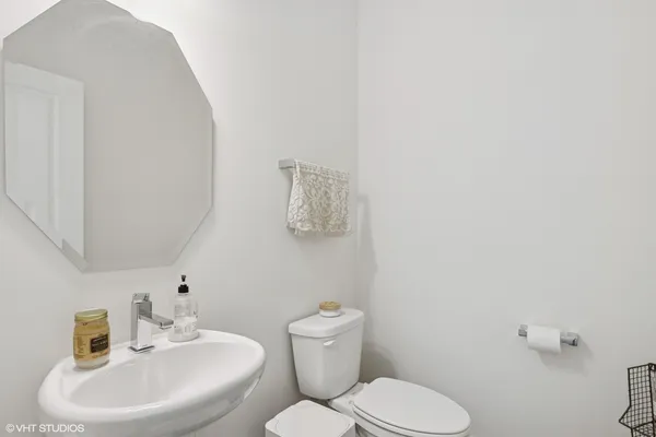 a bathroom with a sink and mirror
