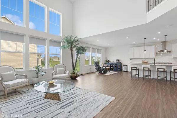 a living room with furniture and a table