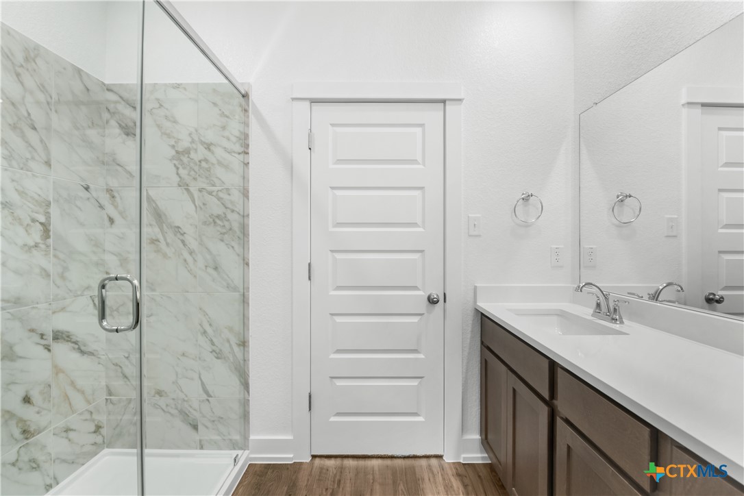 8917 Ponderosa Pine Road Temple, TX 76502 - Photo 8 of 16 a bathroom with a shower and a sink