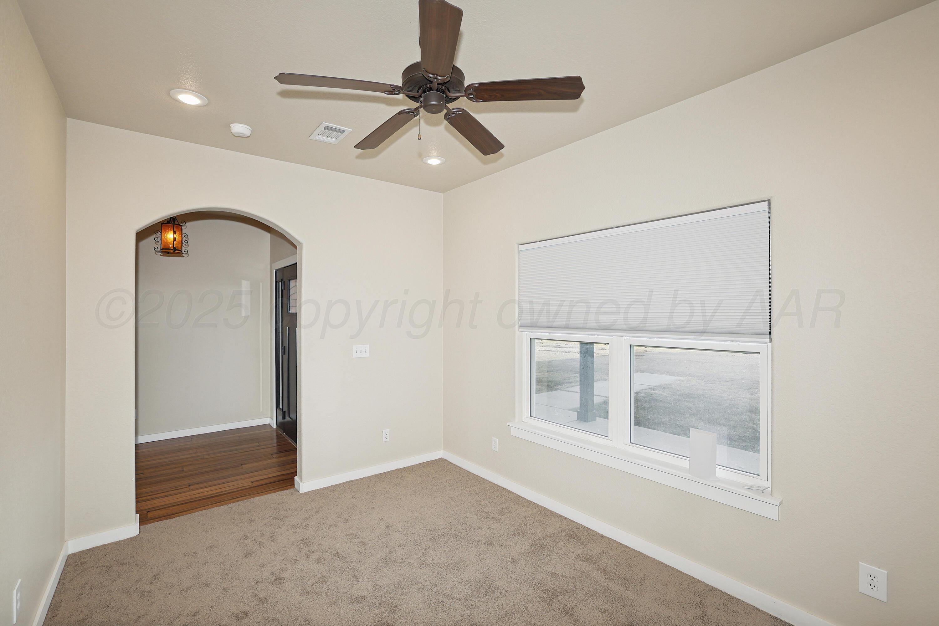 5282 County Road 8 Claude, TX 79019 - Photo 22 of 51 a view of an empty room with a window