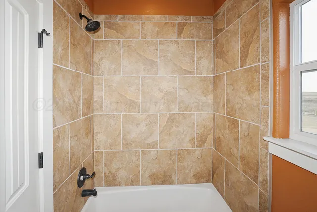 a view of a bathroom with shower