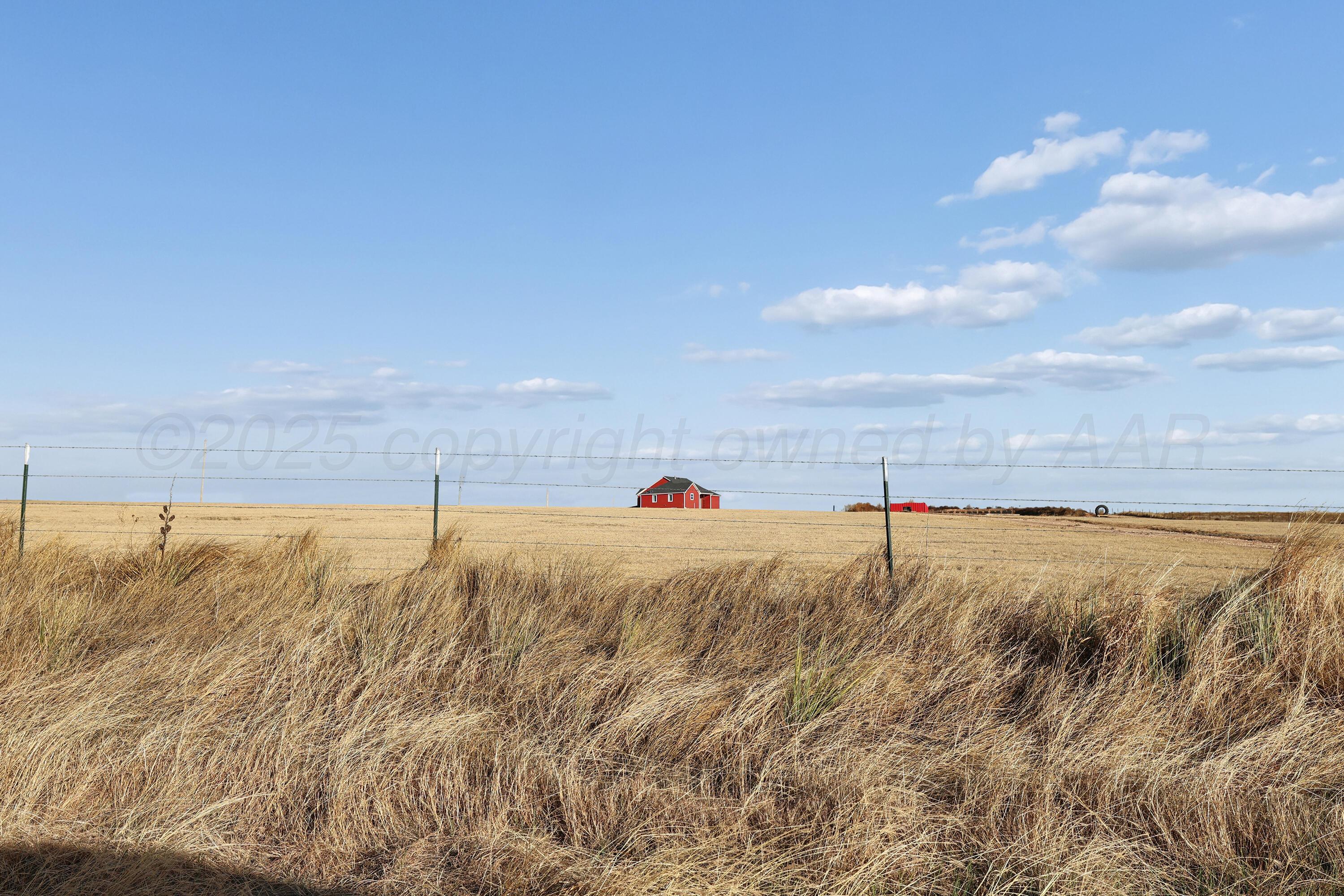 5282 County Road 8 Claude, TX 79019 - Photo 51 of 51 a view of a dry yard with an outdoor space