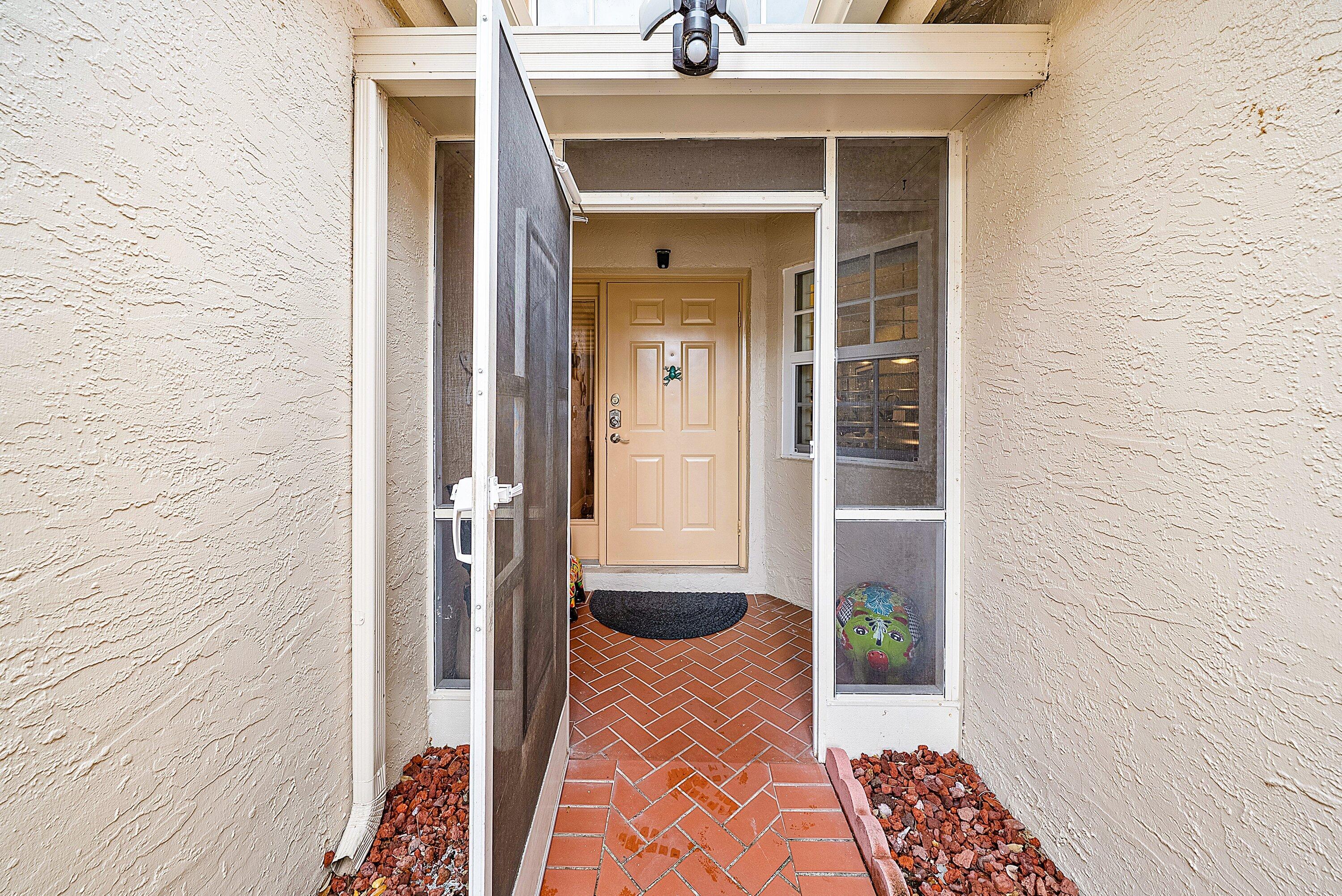 14338 Ruby Pointe Drive Delray Beach, FL 33446 - Photo 4 of 36 a view of entryway