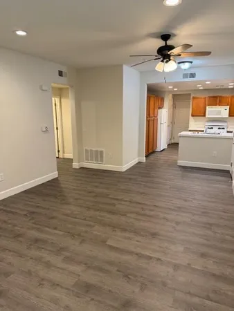 a view of an empty room and window