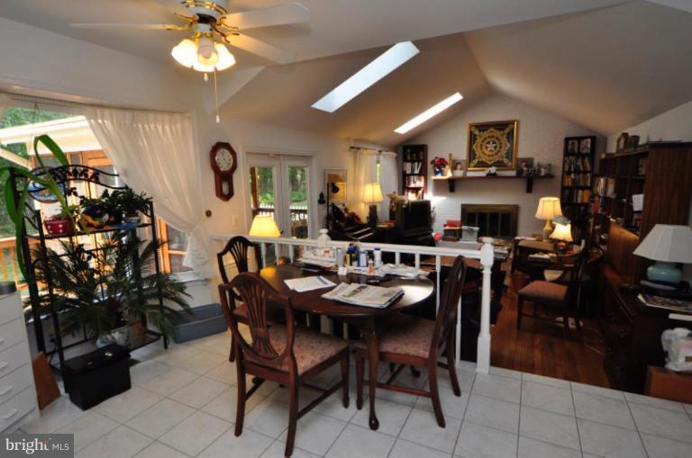 13157 Rounding Run Circle Herndon, VA 20171 - Photo 12 of 14 a view of a dining room with furniture and chandelier