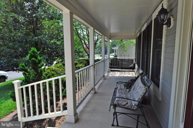 13157 Rounding Run Circle Herndon, VA 20171 - Photo 14 of 14 a view of a balcony with chairs