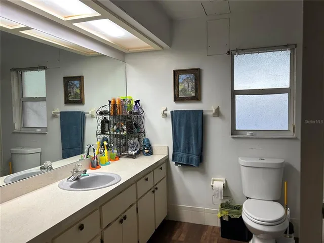 a bedroom with furniture and a bed