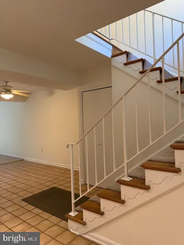 a view of a room with staircase