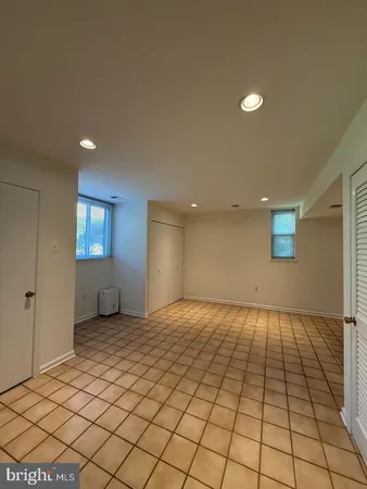 a view of an empty room and window