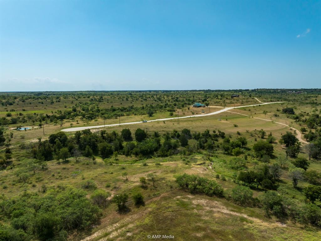 241 Whitetail Spgs Lane Gustine, TX 76455 - Photo 3 of 15 a view of a lake with a city